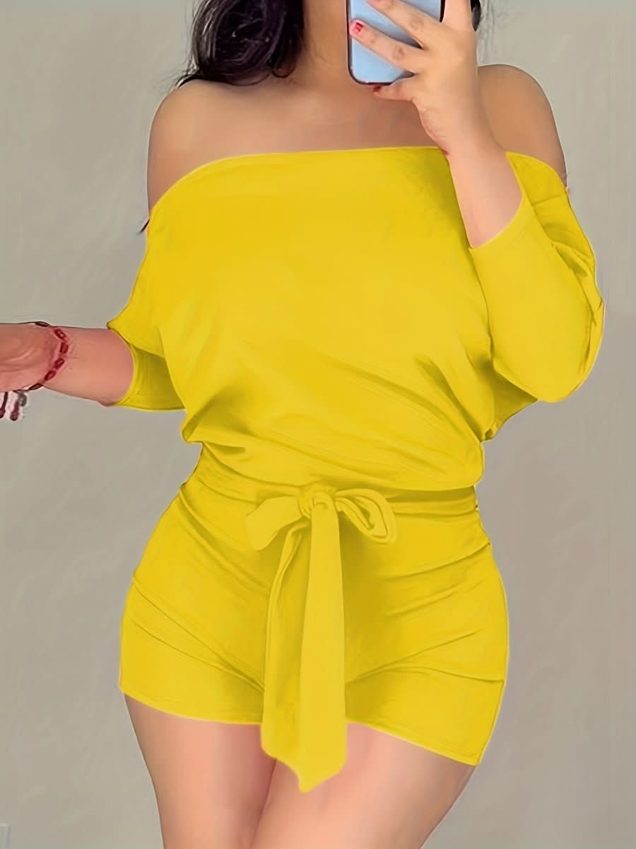 Chic women's batwing romper shorts, a comfortable & versatile casual outfit for sunny summer days & daytime chic.