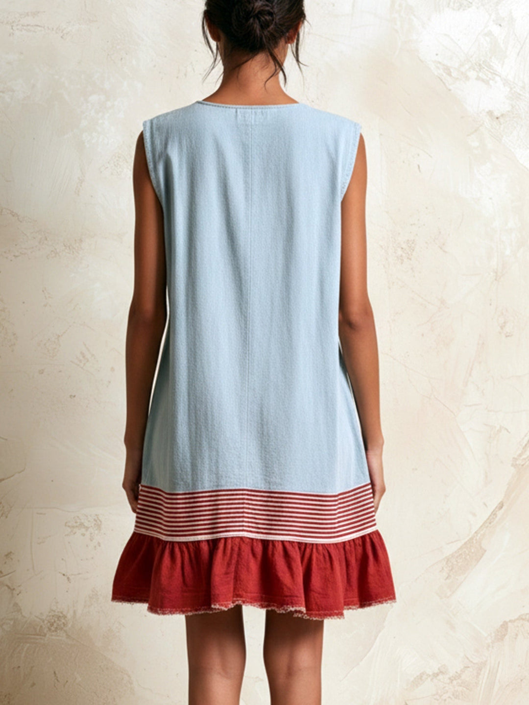 Boho style women's blue mini dress, sleeveless with tiered ruffle hem, ideal for casual summer fashion.