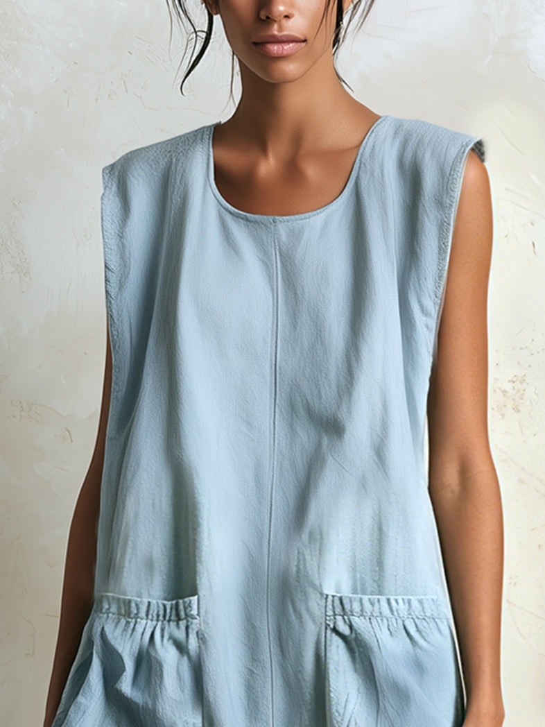 Vibrant blue mini dress for women, sleeveless and tiered with a contrasting ruffle hem, perfect for boho summer.