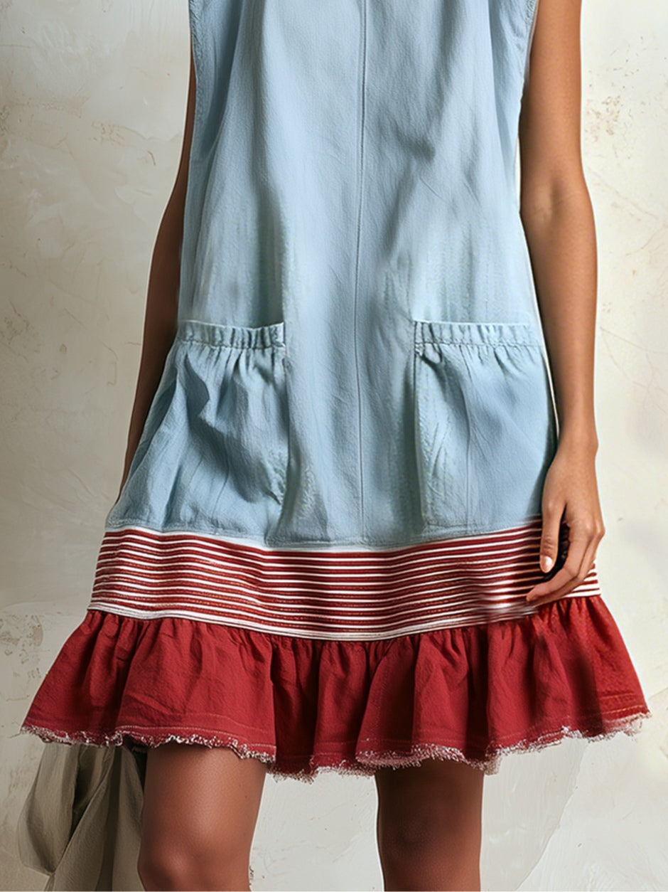 Women's casual blue mini dress, sleeveless and tiered with a stylish ruffle and contrast hem, summer fashion.