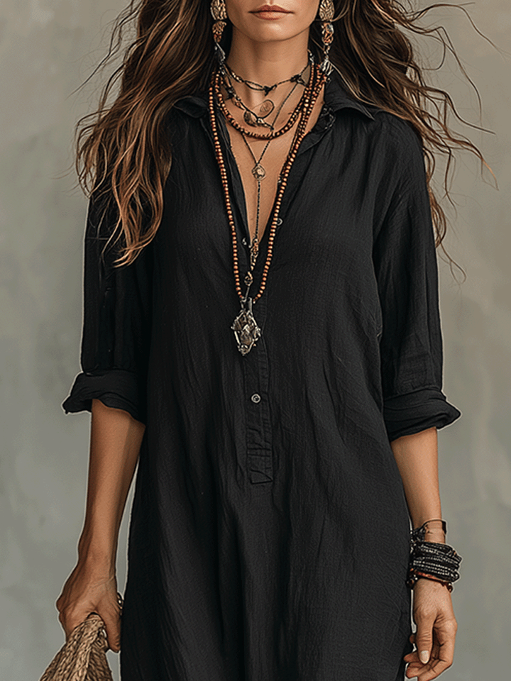 Chic women's bohemian maxi dress, perfect for warm weather, highlighting its flattering button-front.