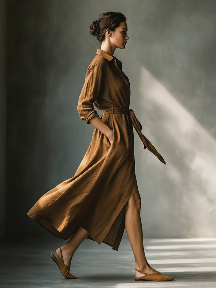 Chic brown V-neck maxi shirt dress with long sleeves & tie waist for women. A versatile casual fall fashion staple.