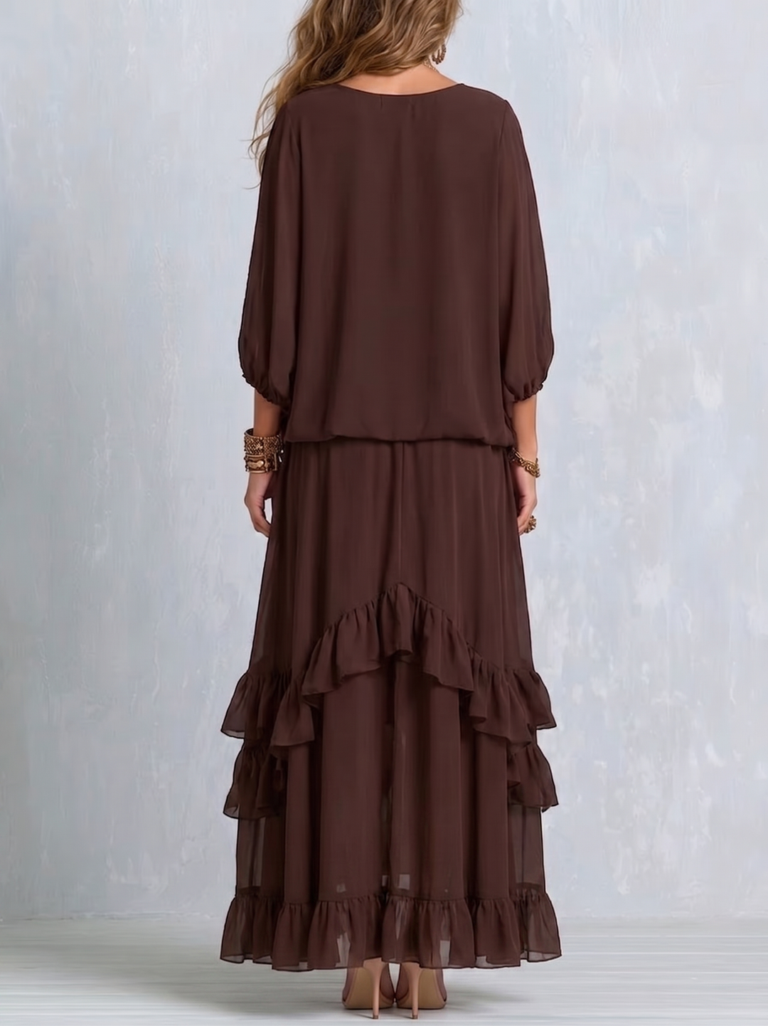 Elegant brown wrap maxi dress for women featuring a V-neck and tiered ruffle hem, ideal for casual or event wear.