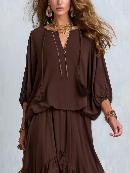 Boho brown wrap maxi dress for women, featuring a flattering V-neck, long sleeves, and a flowy tiered ruffle hem.