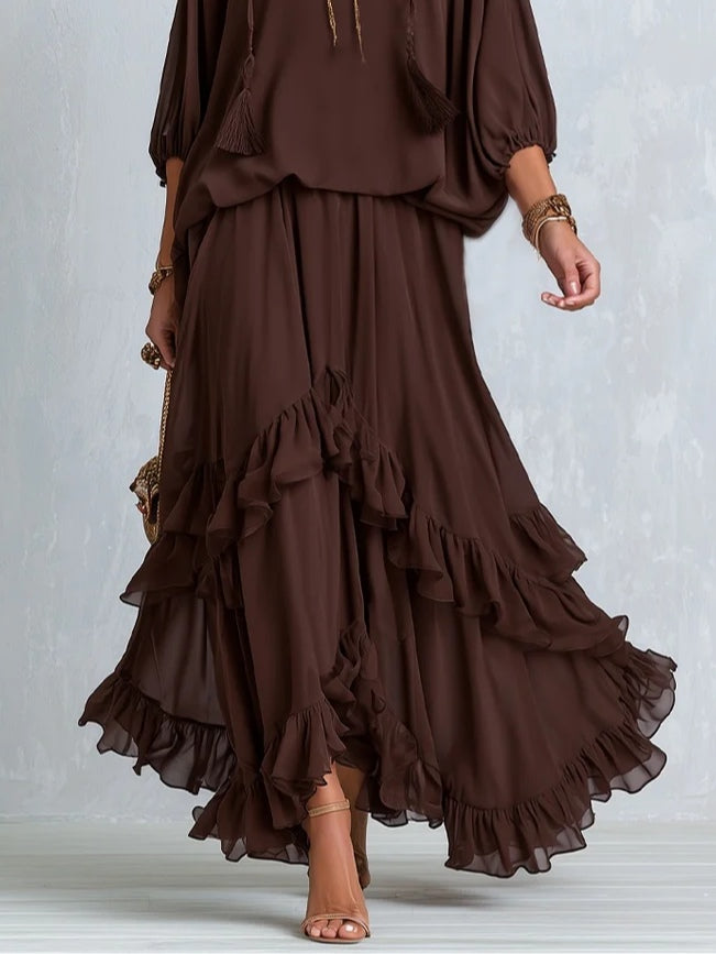 Comfortable brown wrap maxi dress with a stylish V-neck, long sleeves, and beautiful tiered ruffle hem detail.