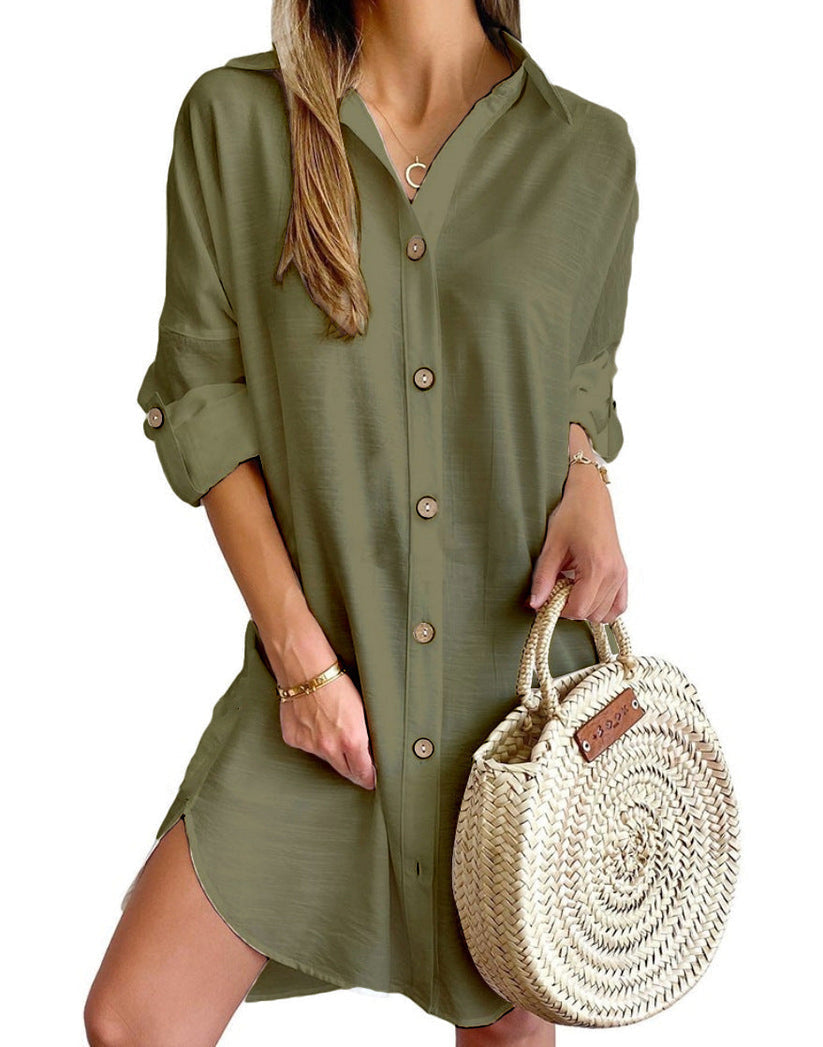 Blue women's effortless shirt dress. Casual button-down short dress with roll-tab sleeves, great for summer.