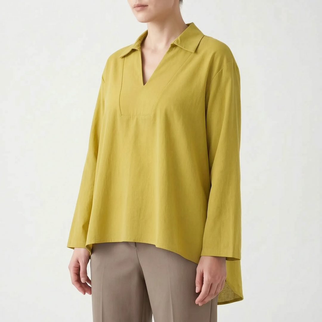 Effortless women's casual tunic with a stylish high-low hem. Loose fit, long sleeve, v-neck for comfort.