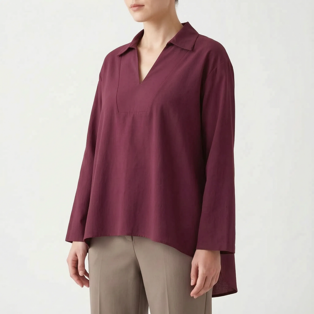 Women's smart casual high-low tunic top. Loose fit long sleeve v-neck blouse for everyday & summer fashion.