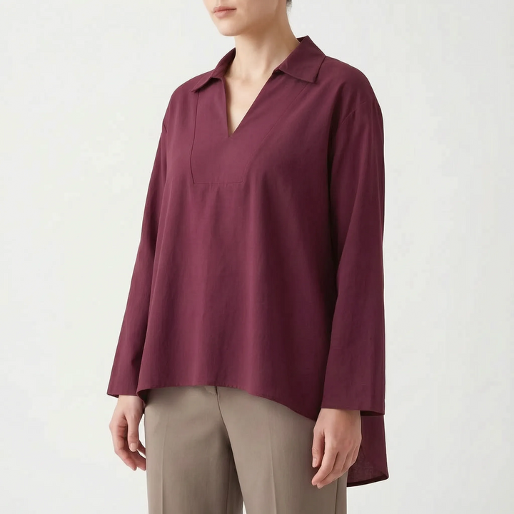 Women's smart casual high-low tunic top. Loose fit long sleeve v-neck blouse for everyday & summer fashion.