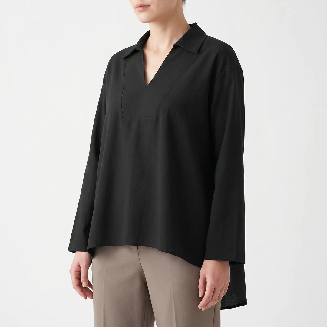 Flowy women's casual high-low tunic, long sleeve, v-neck. A versatile blouse for effortless summer style.