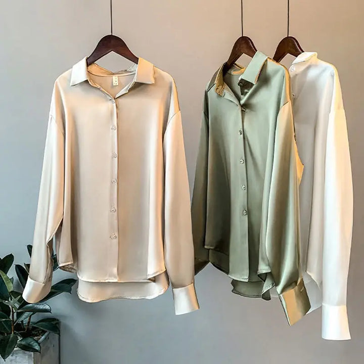 Flat lay of women's versatile long-sleeve Effortless Chic blouse. Comfortable, stylish, and perfect for casual or office everyday wear.