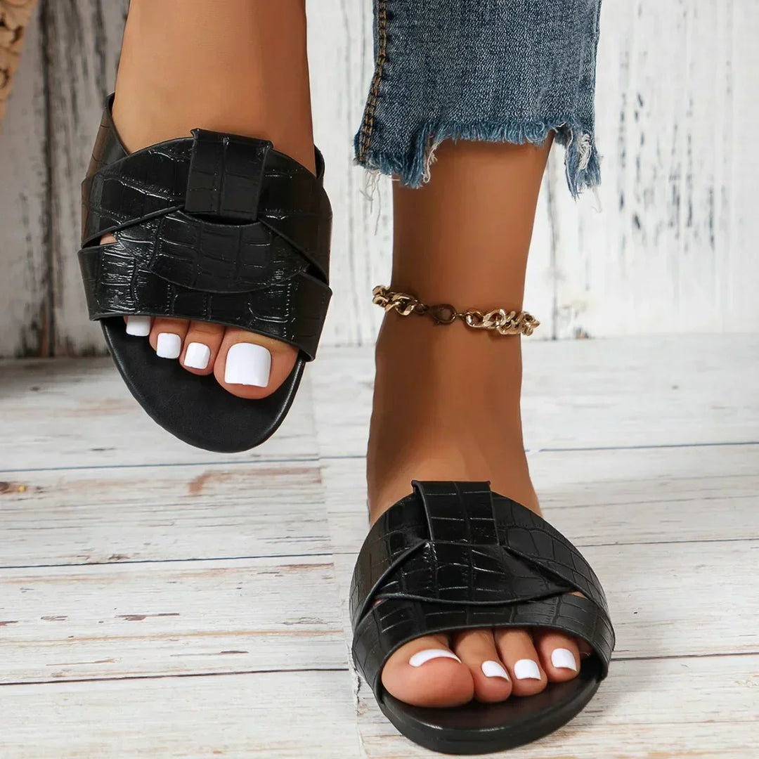 Women's casual comfort slide sandals, a lightweight slip-on design for effortless summer style.