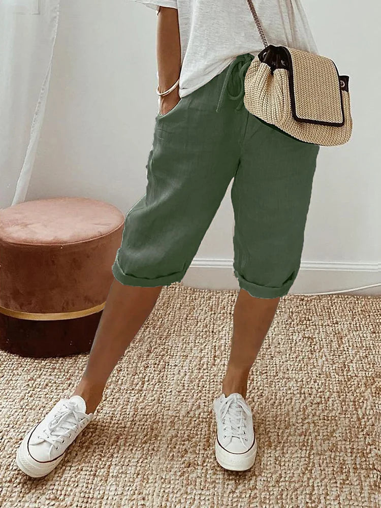 Stylish women's relaxed fit shorts for warm weather, offering effortless comfort for everyday wear. Casual fashion.