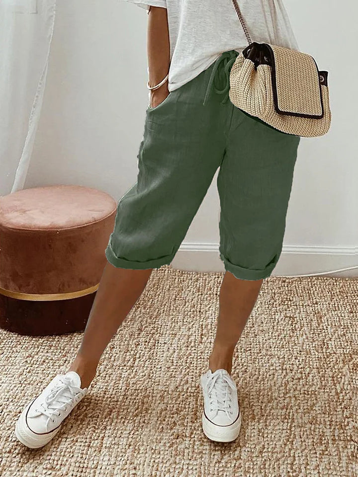 Stylish women's relaxed fit shorts for warm weather, offering effortless comfort for everyday wear. Casual fashion.