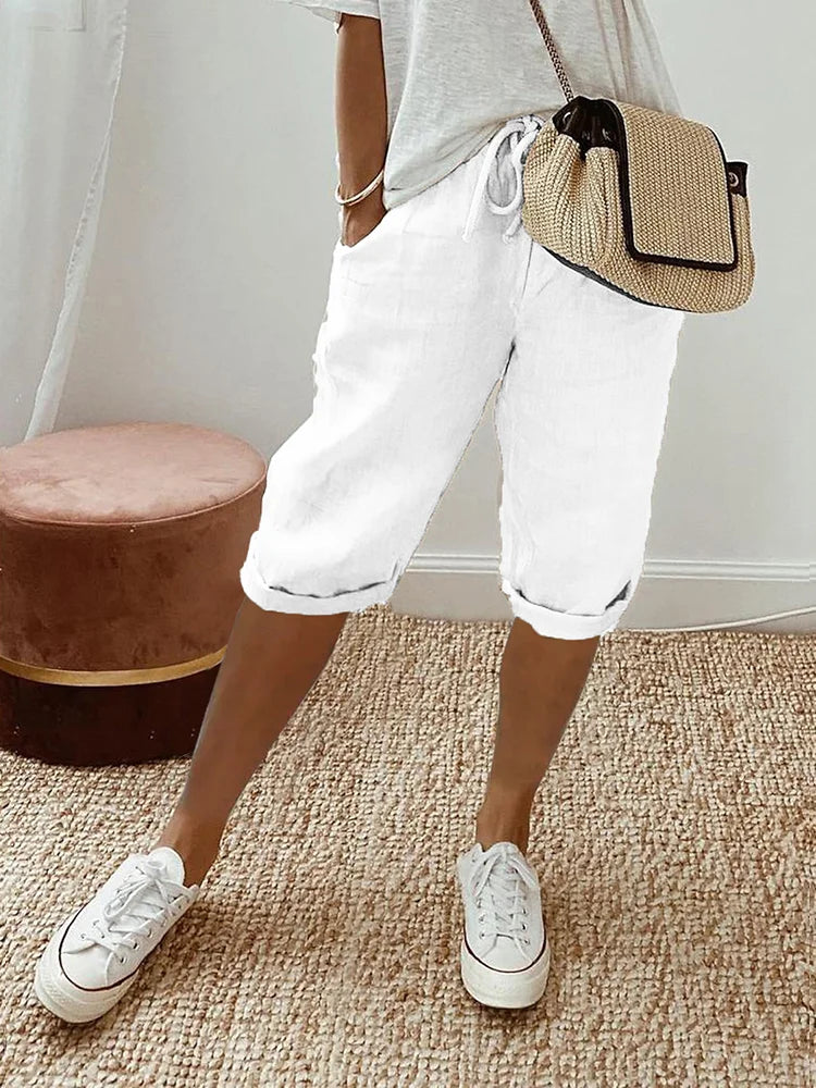 Practical women's casual shorts, relaxed fit with pockets & elastic drawstring waist, great for active summer days.
