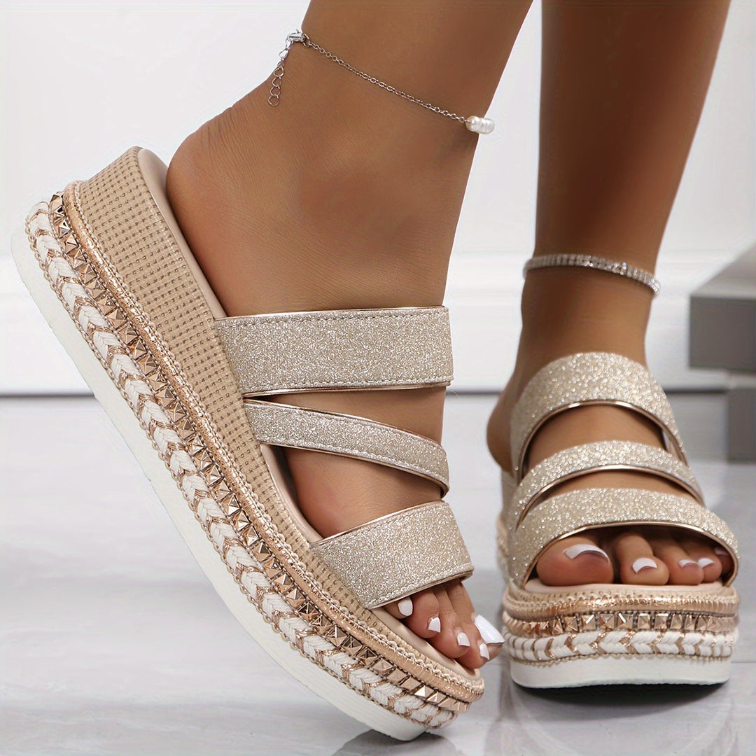 Lightweight women's flat summer sandals, easy slip-on style for casual all-day comfort.