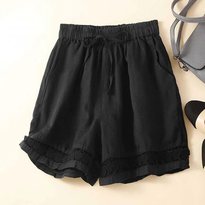 Relaxed fit women's floral print shorts with elastic waist, perfect for casual summer days.