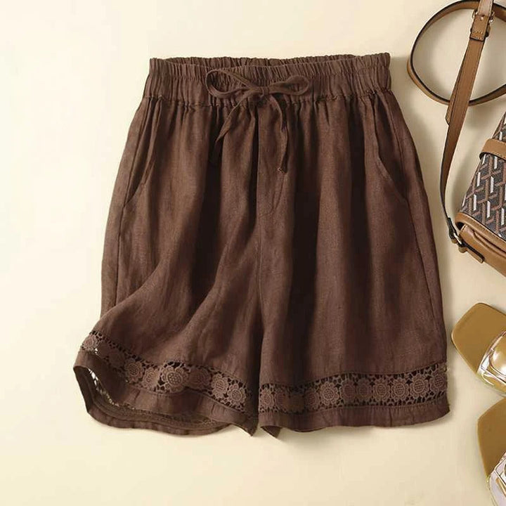 Comfortable women's floral shorts featuring an elastic waist & relaxed fit for summer style.