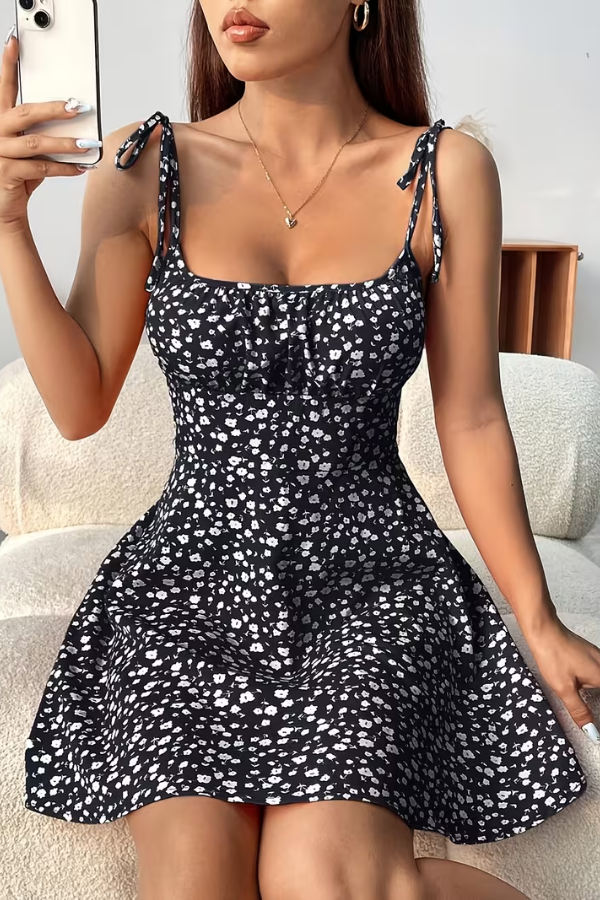 Women's effortless floral strapless slip dress, perfect for summer fashion and casual wear. Elegant and flowy design.
