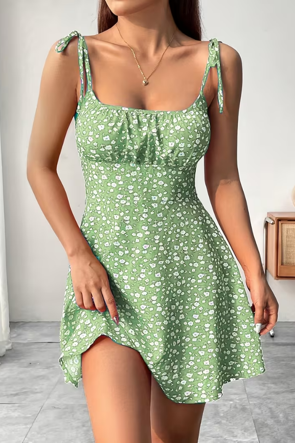 Flowy floral strapless slip dress for women. Effortless style, comfortable fit, ideal for summer and casual outings.
