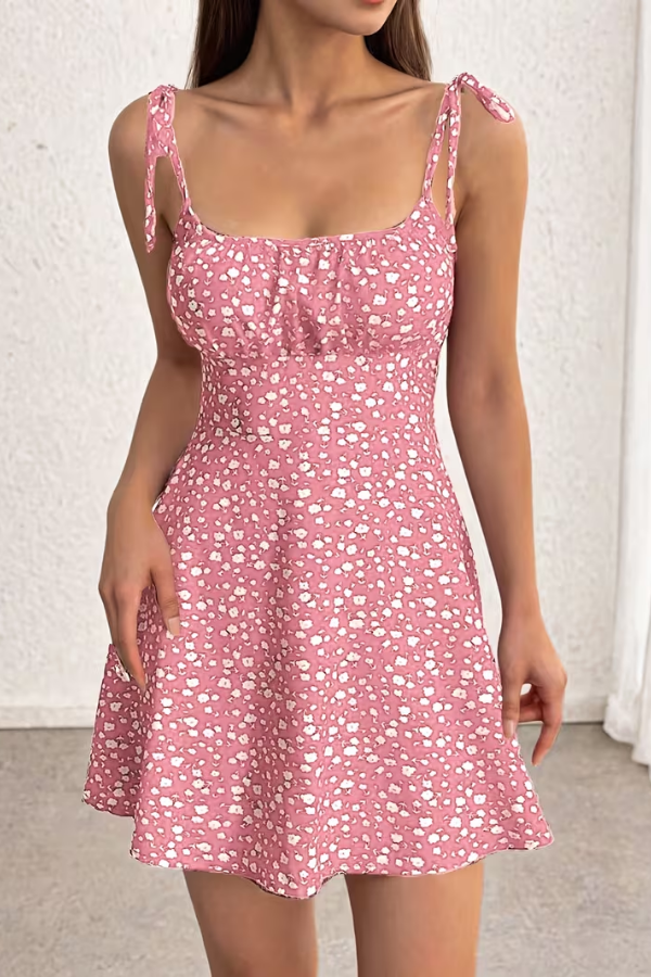 Vibrant floral print strapless slip dress for women. Chic and effortless summer fashion, perfect for any occasion.