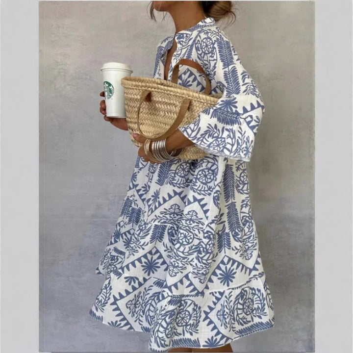 Women's effortless floral sundress, tiered boho tunic style, perfect for summer casual wear.