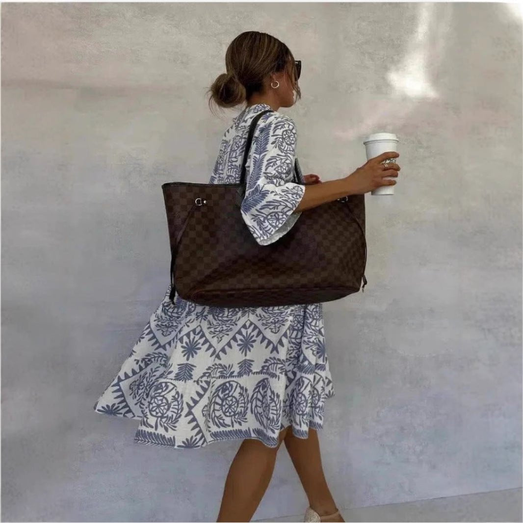 Boho floral print women's sundress featuring a tiered skirt and tunic style, great for summer fashion.