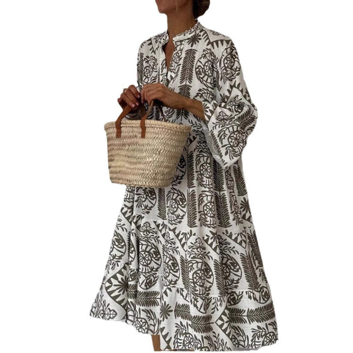 Effortless women's floral print tiered sundress in light blue, perfect for resort or weekend comfort.