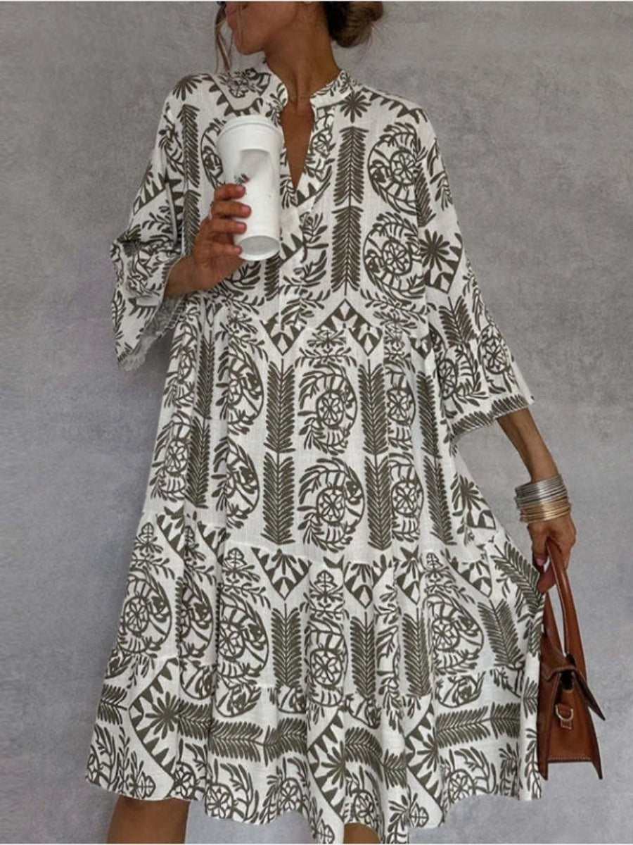 Casual floral print tunic dress for women, tiered boho style, easy fit for summer & everyday wear.