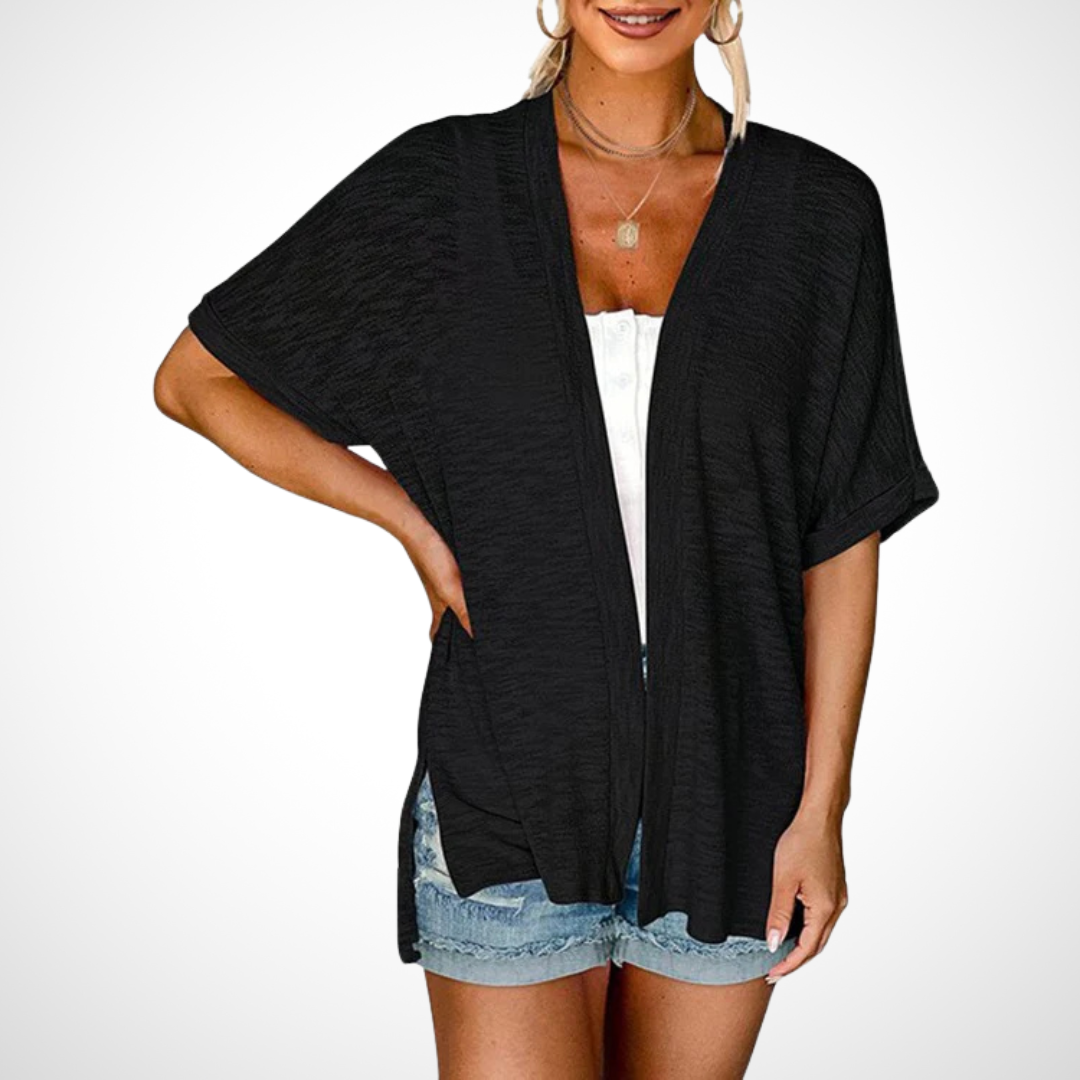 Lightweight open-front short sleeve cardigan for women. Effortless summer layering, comfortable & chic.