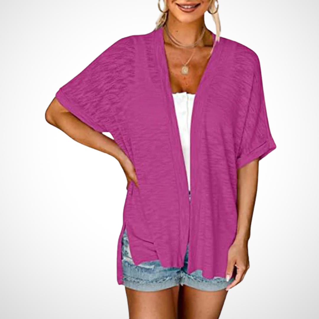 Comfortable women's short sleeve flowing cardigan. Elegant, lightweight, open front style for summer outfits.