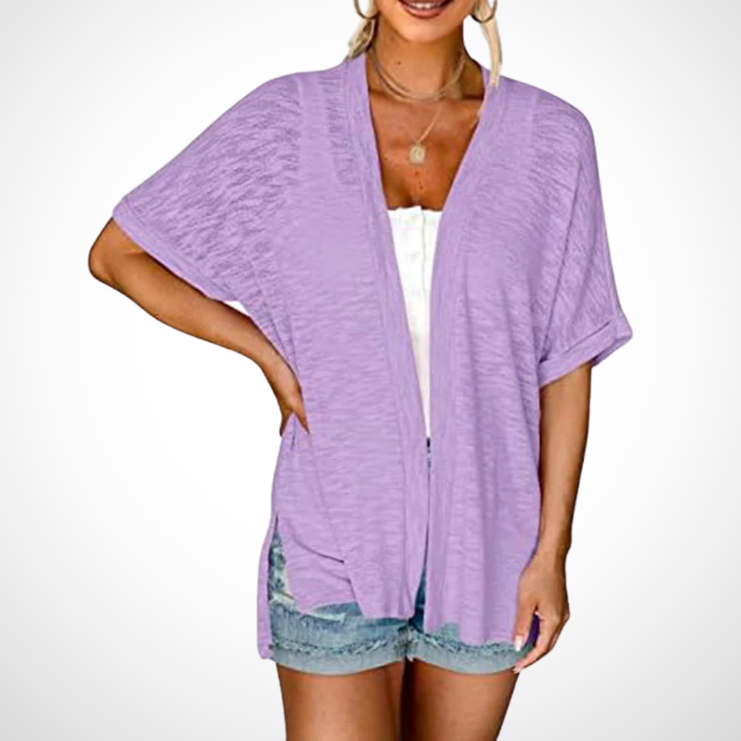 Women's short sleeve flowing cardigan. Lightweight, open front, versatile top for elegant summer fashion.