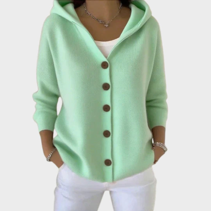 Stylish women's hooded button-front cardigan sweater in a relaxed fit, great for everyday wear.