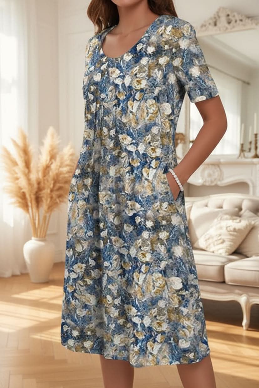 Effortless knee-length dress for women. Features pockets, ideal for comfortable daily wear.