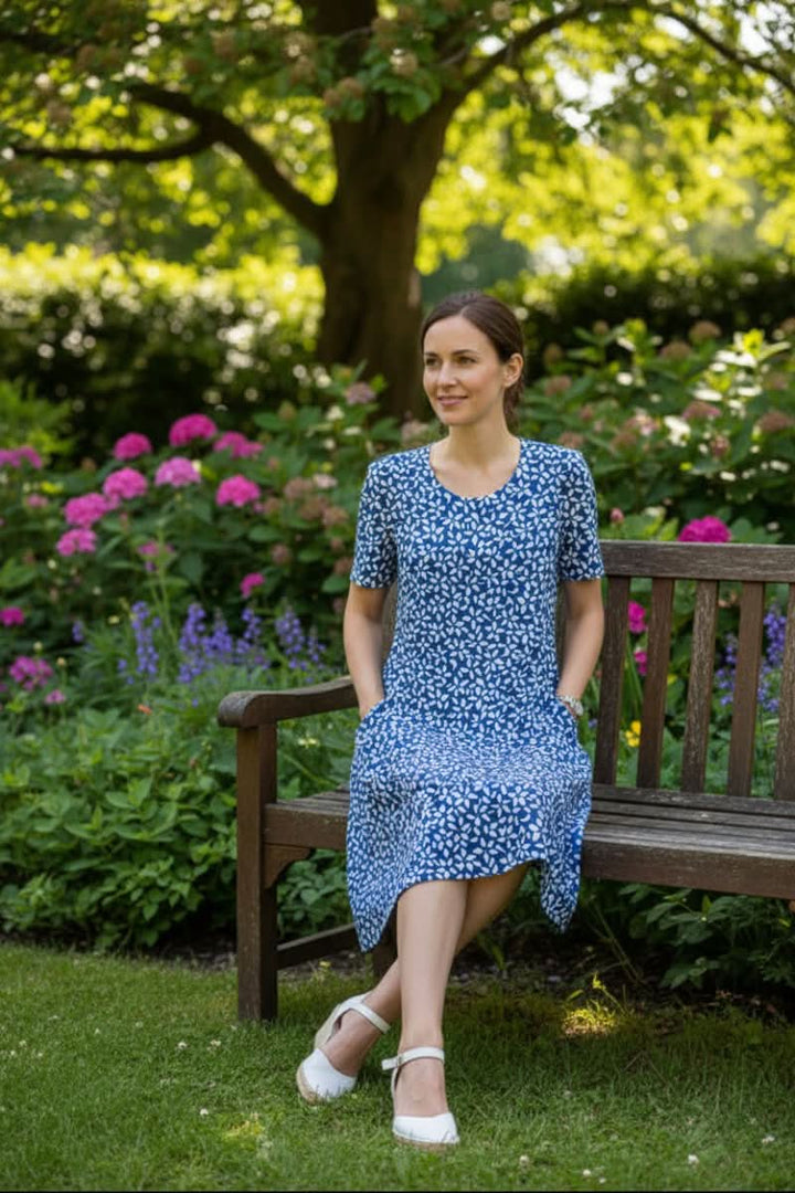 Comfortable women's polka dot knee-length dress. Effortless style for casual or dressy occasions.