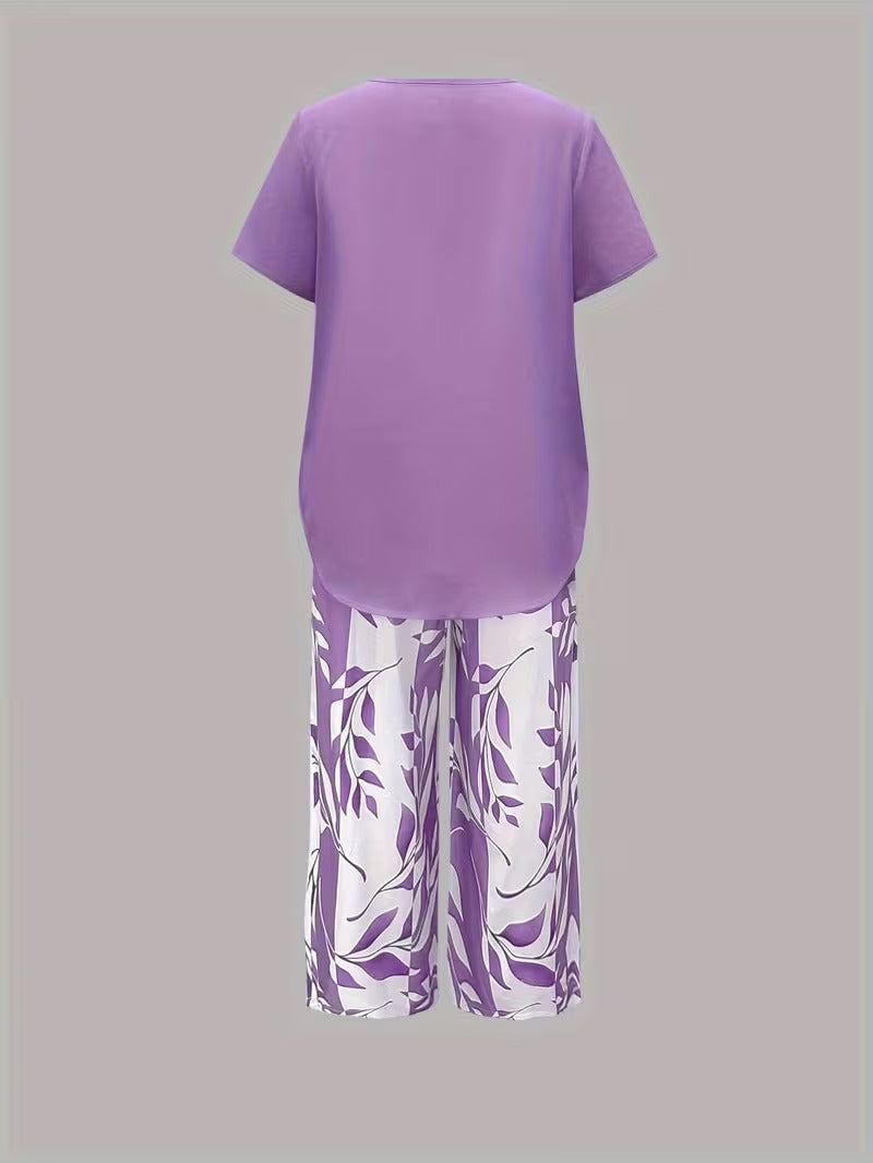Versatile women's leaf print top & cropped pants 2-piece set. Casual, relaxed, and travel-ready summer outfit.