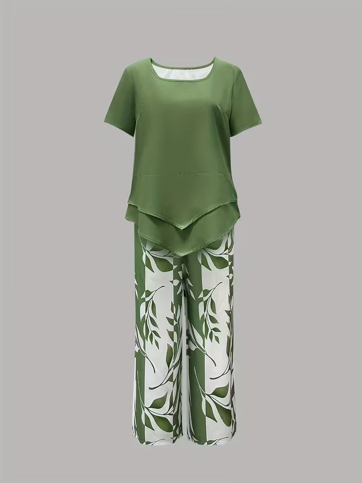 Front view: Women's short-sleeve leaf print top & matching cropped pants. Effortless 2-piece casual outfit.