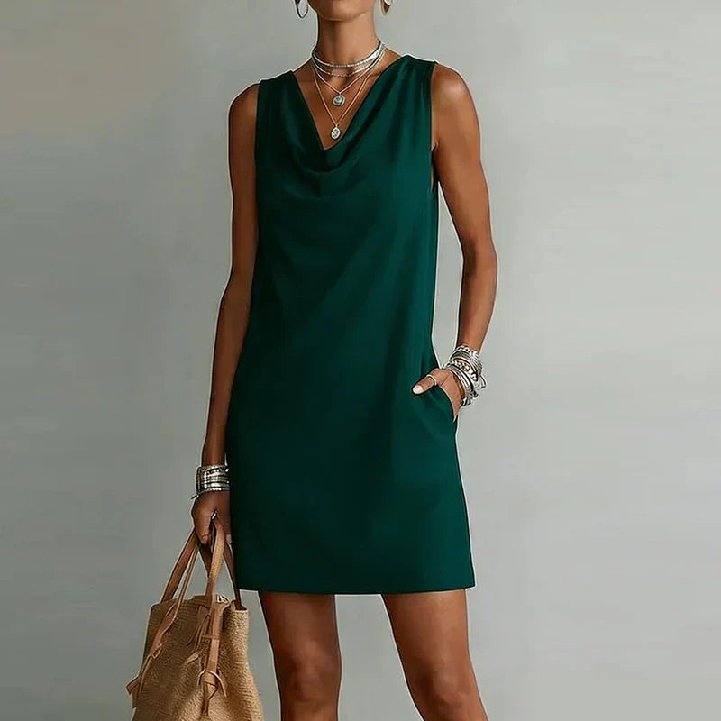 Women's effortless lightweight sleeveless mini dress with pockets, perfect for summer casual wear.