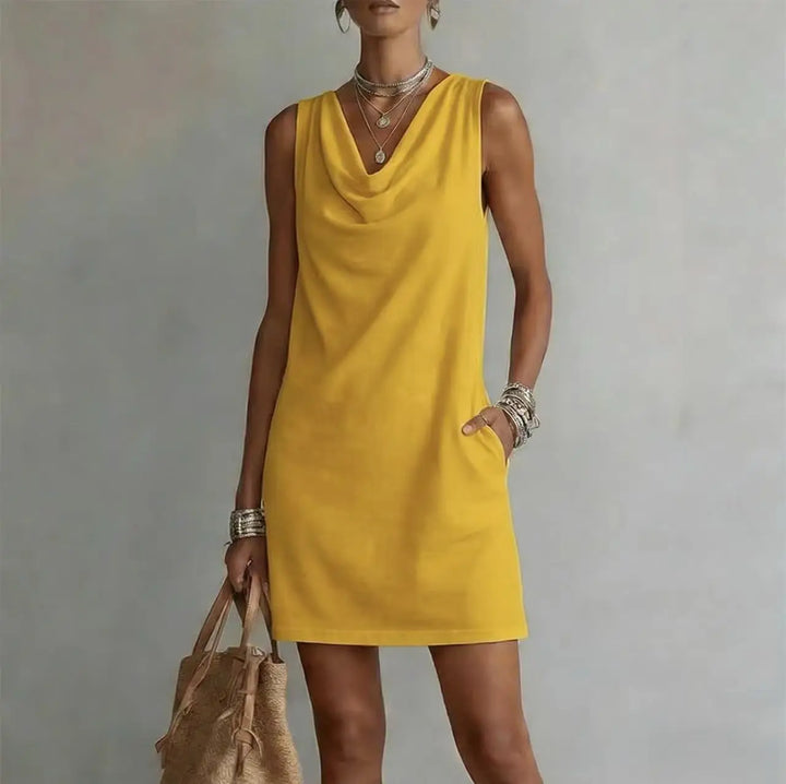 Stylish women's pocket mini dress. A lightweight, sleeveless summer essential for casual fashion & vacation.