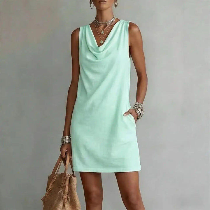 Simple lightweight women's mini dress, perfect as a sleeveless summer dress with convenient pockets.