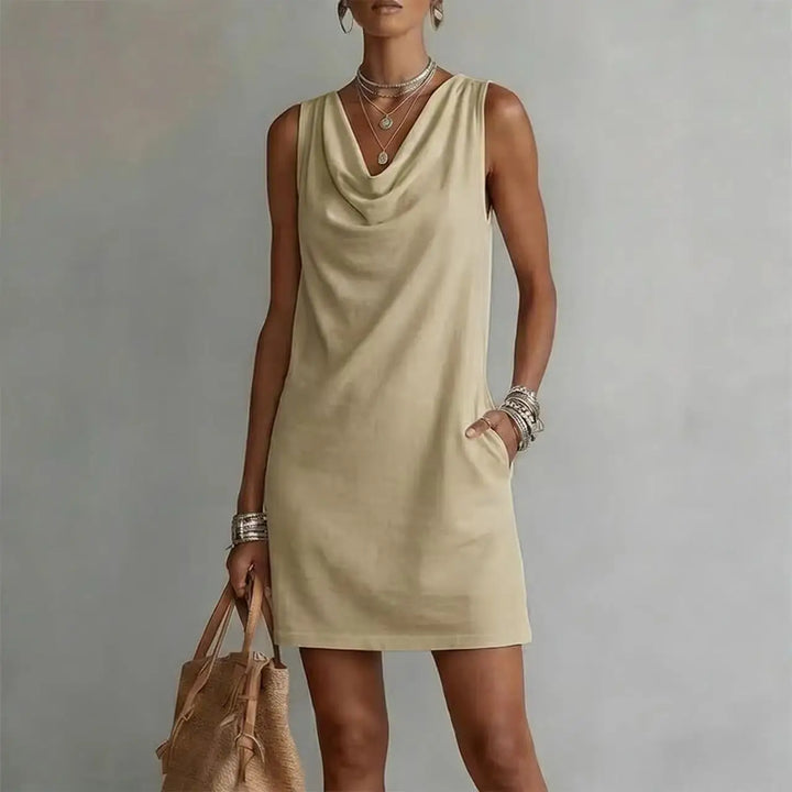 Women's effortless mini dress with a relaxed fit. Sleeveless design & pockets make it a perfect casual summer staple.