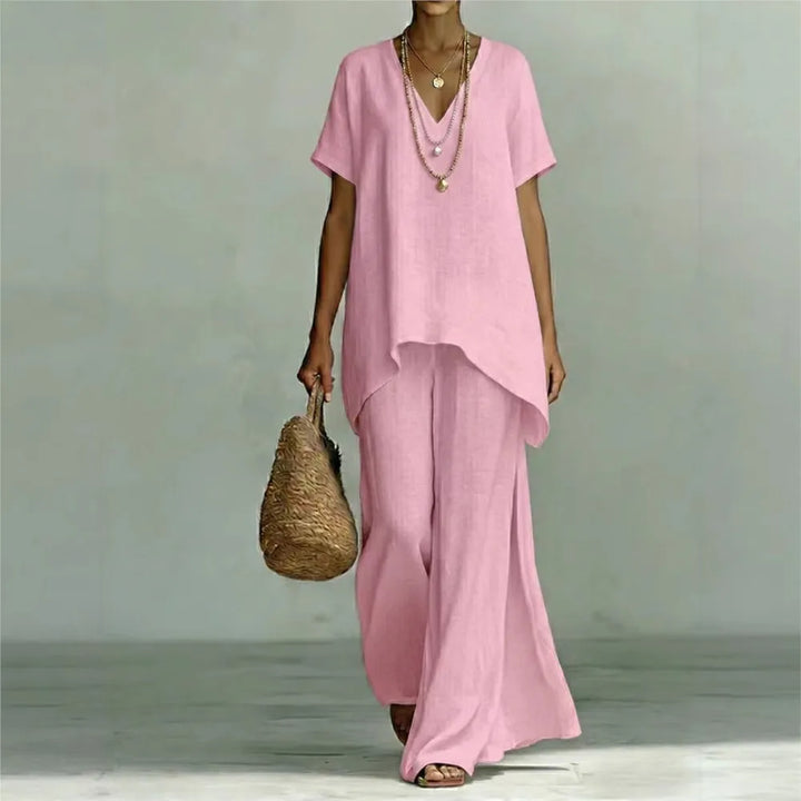 Stylish women's linen blend asymmetrical top from a matching two-piece set. Ideal for summer casual or resort wear.