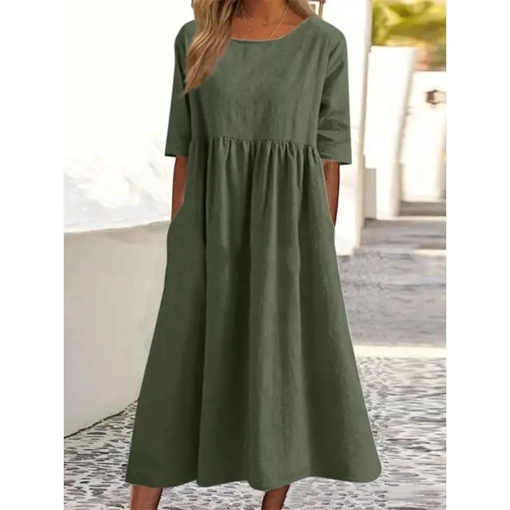 Women's effortless maxi dress, comfortable and flowing, with practical pockets & stylish half-sleeves for everyday wear.