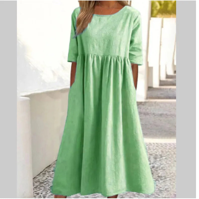 Comfortable & flowing women's maxi dress with half-sleeves, pockets. Perfect versatile ankle-length everyday wear.