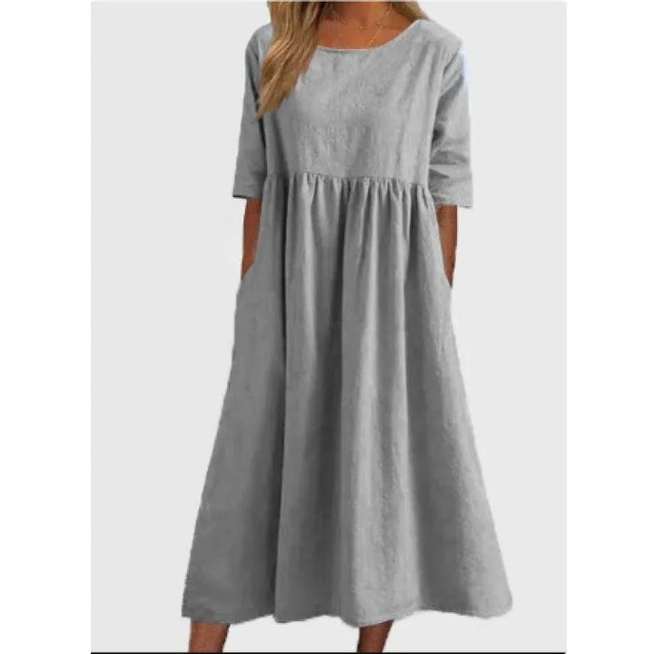 Versatile women's elegant maxi dress, featuring half-sleeves & pockets. Ideal for comfortable, modest summer fashion.