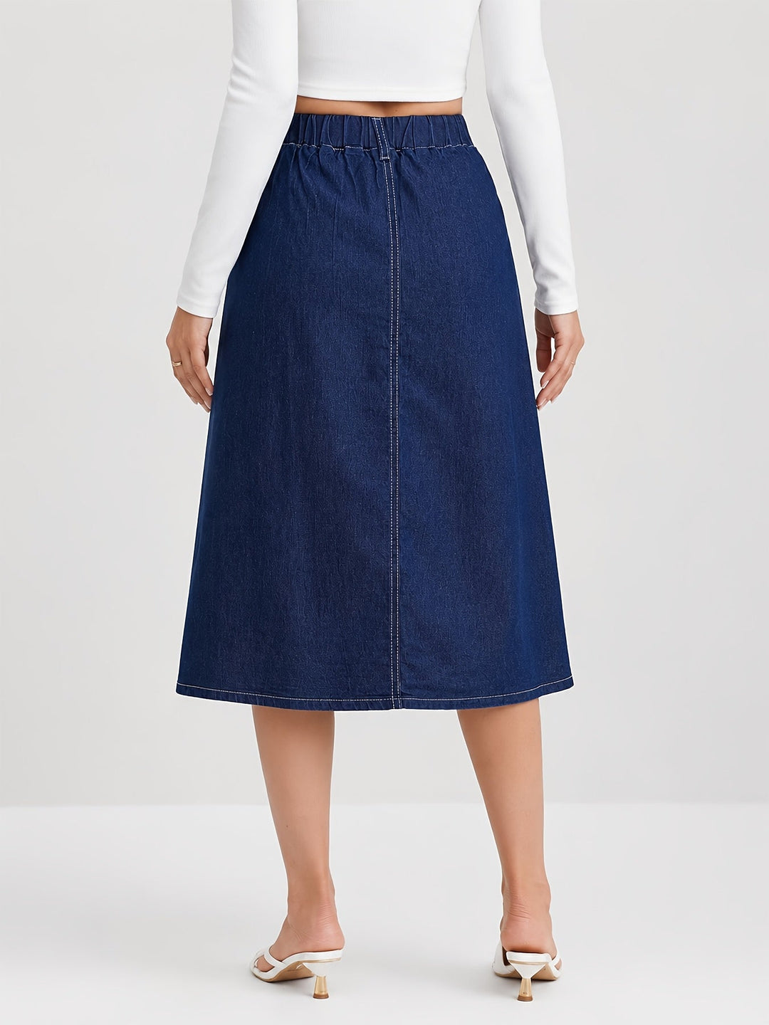 Casual women's medium blue denim A-line midi skirt, perfect for summer fashion & everyday versatile wear.