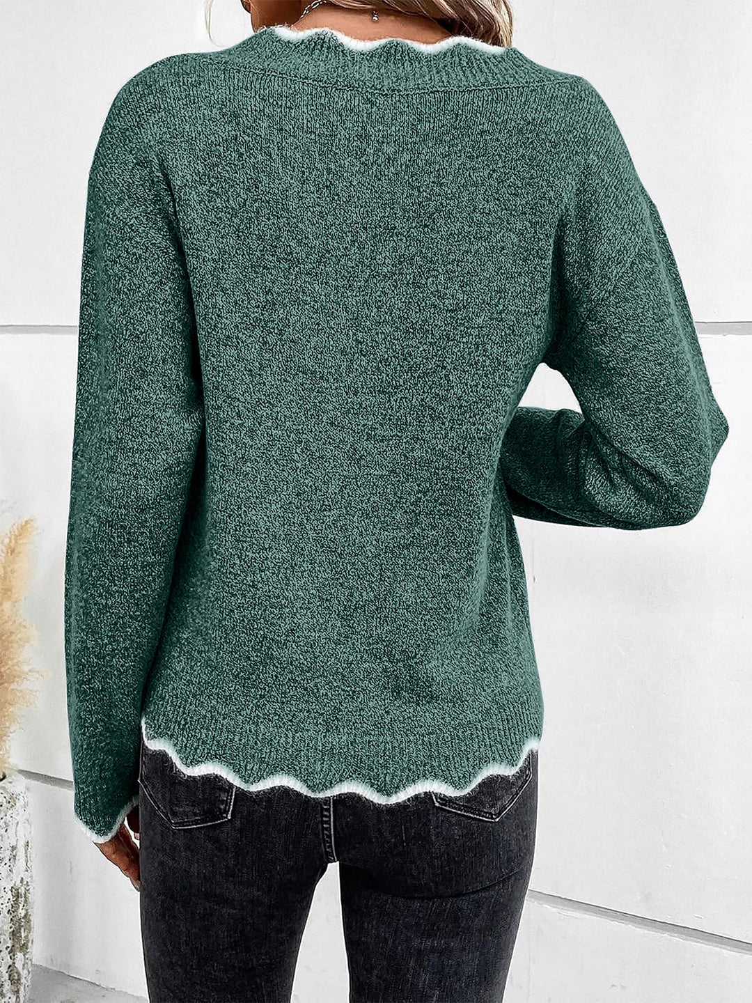 Relaxed fit women's v-neck pullover for effortless casual elegance.