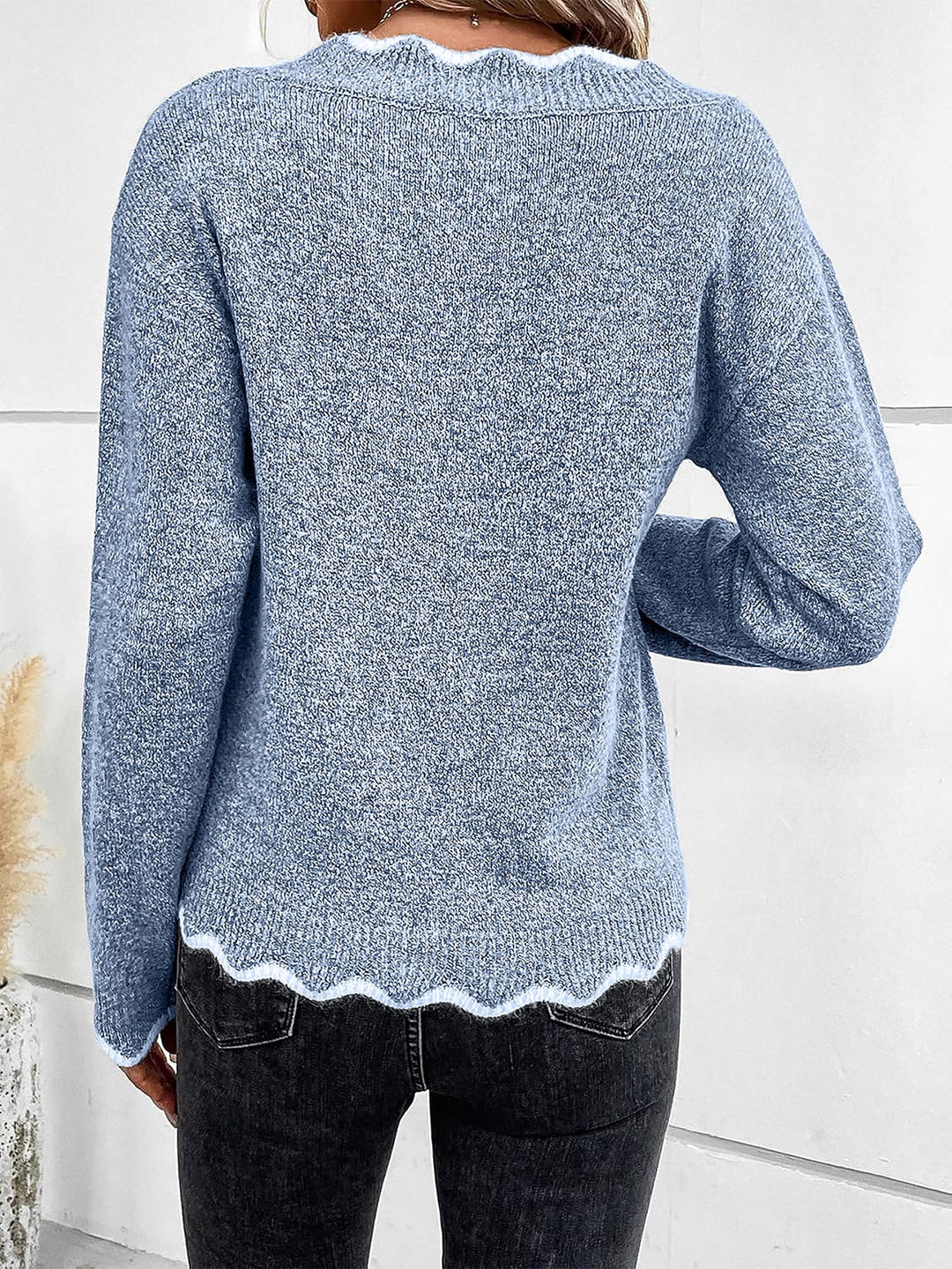 Chic women's relaxed fit pullover sweatshirt with stylish notch v-neck.