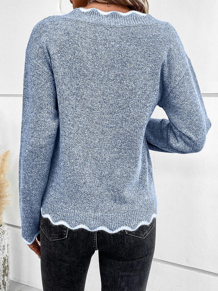 Chic women's relaxed fit pullover sweatshirt with stylish notch v-neck.