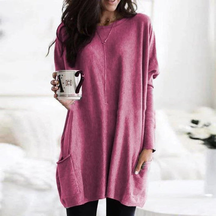 Women's oversized long sleeve pocket tunic top, a comfortable choice for easy, casual style.